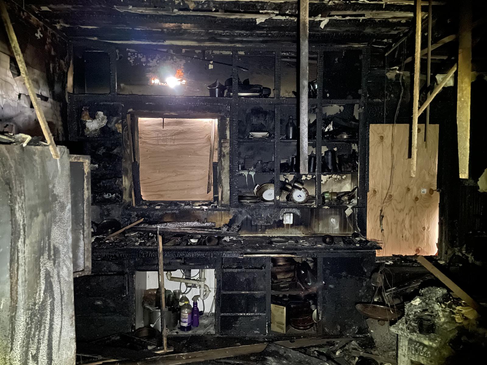 Fire-damaged interior before Heritage commercial fire restoration